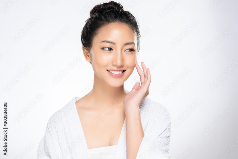 Beautiful young Asian woman touching soft cheek and smile with clean and fresh skin. Happiness and cheerful with, isolated on white background, Beauty and Cosmetics Concept, Beautiful young Asian woman touching soft cheek and smile with clean and fresh skin. Happiness and cheerful with, isolated on white background, Beauty and Cosmetics Concept,