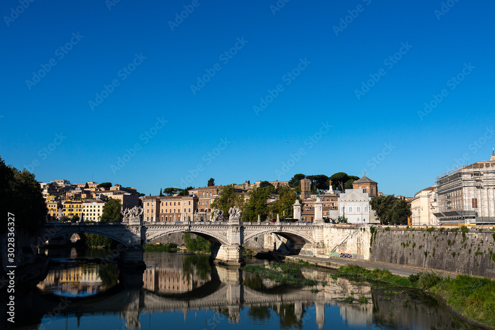 View to city of Rome and Tiber from Saint Angelo bridge