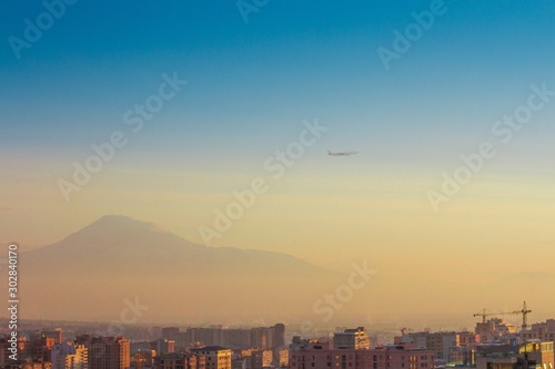High angle shot of a cityscape of Yerevan, Armenia with Mount Ararat photo