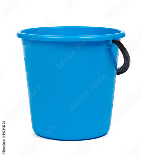 Blue plastic bucket for cleaning isolated on white background photo