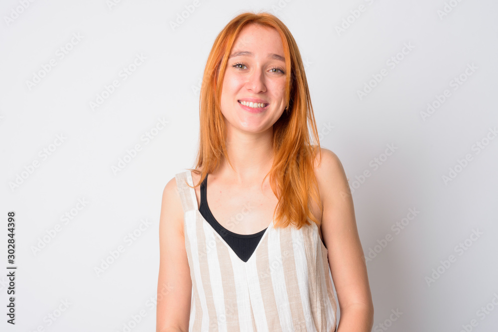 Face of happy young beautiful redhead woman smiling Face of happy young beautiful redhead woman smiling