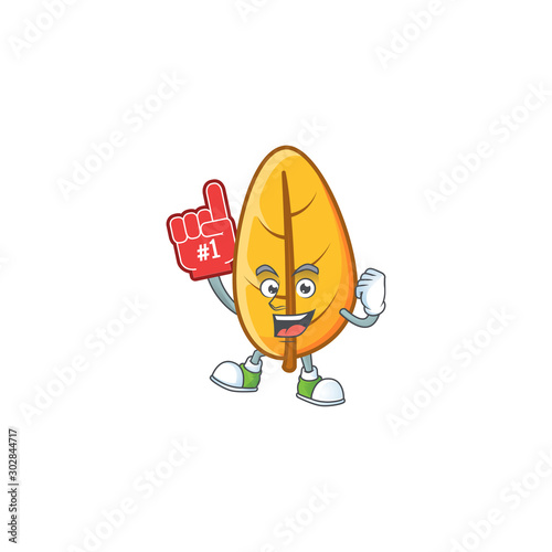 Yellow autumn leaves in with mascot foam finger