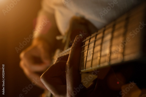 Performing a guitar melody from the stage