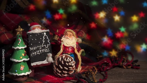 Digital composite of Falling snow with Christmas Santa decoration