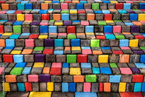 Stacked Multicolor and Colorful cement block stair and corridor for background, Abstract colorful concrete block texture.