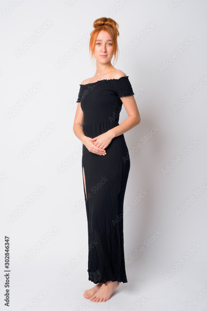 Full body shot of young beautiful redhead woman Full body shot of young beautiful redhead woman