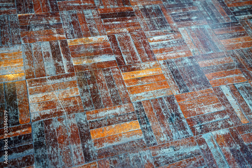 Close up old parquet flooring