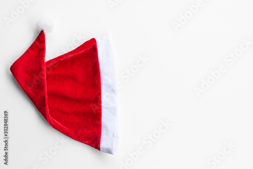 red Santa hat on white background