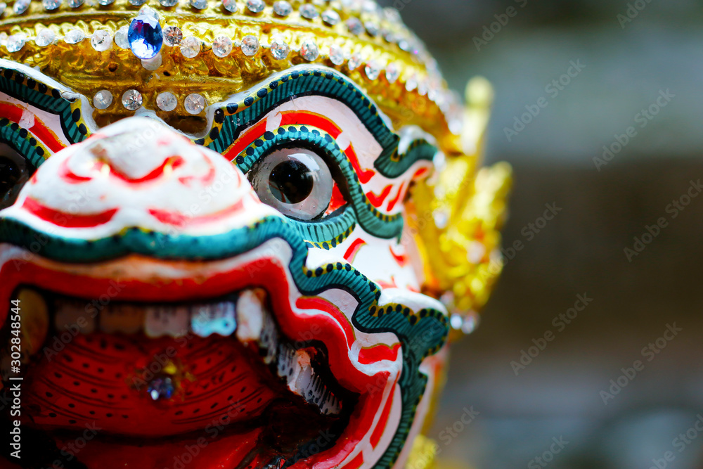 Fototapeta premium head of hanuman doll during traditional performance in buddhist temple -Thailand