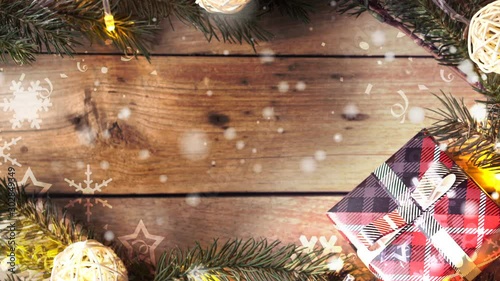 Christmas decoration on wooden table , snowflakes falling and copy space for celebration , new year , thanksgiving concept background