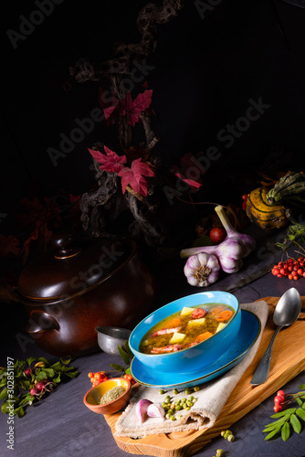 polish pea soup (grochowka) with smoked bacon and sausage photo