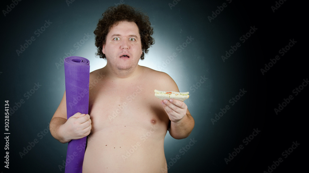 Fototapeta premium Diet and healthy lifestyle. Funny fat guy.