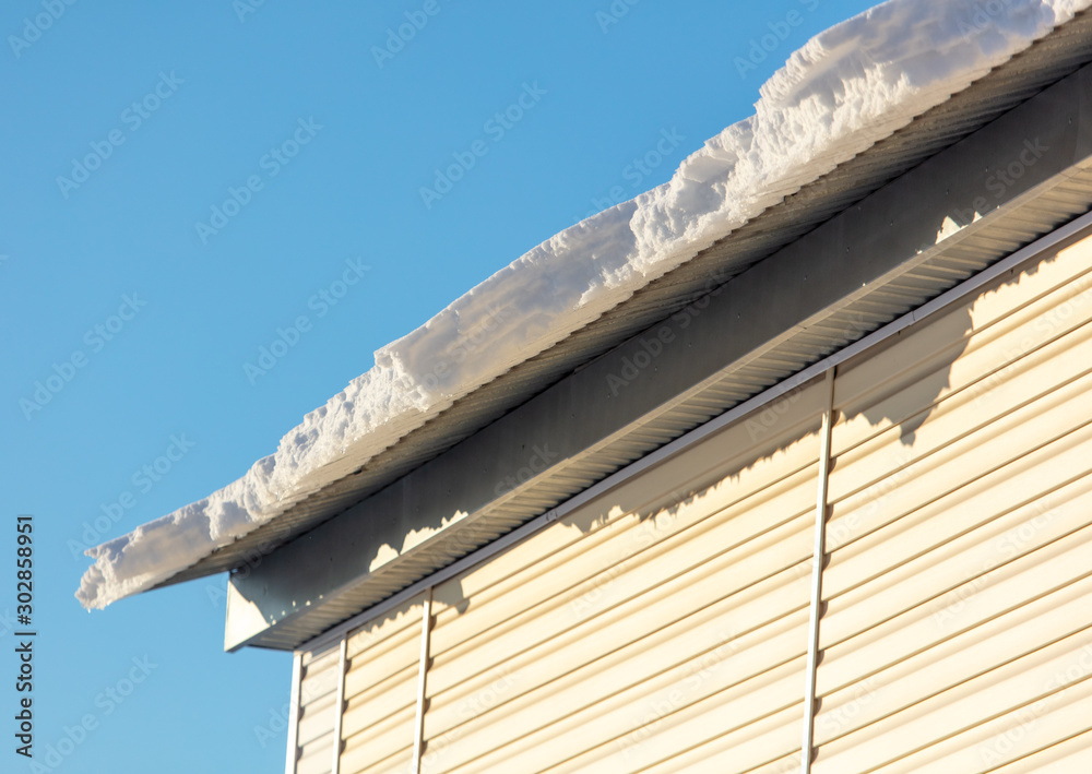 House with snow on the roof House with snow on the roof