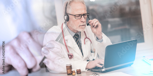 Portrait of doctor during online medical consultation; multiple exposure