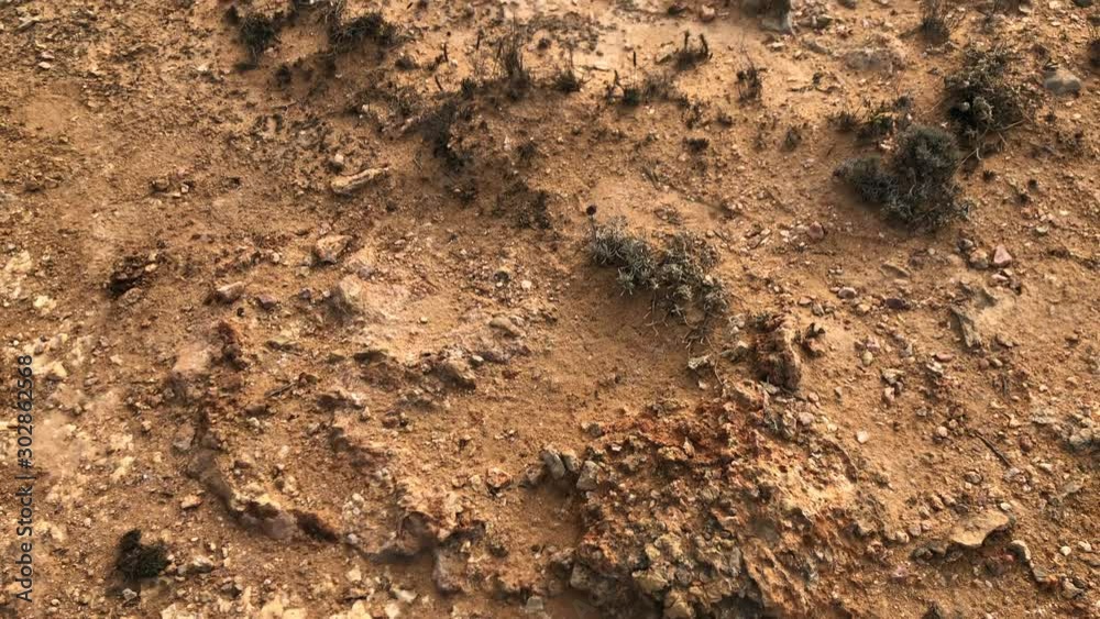 This is a video of a rocky trail leading into an ocean cliff This is a video of a rocky trail leading into an ocean cliff