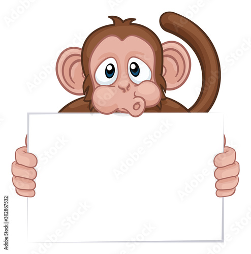 A monkey cute happy cartoon character animal holding a blank sign with copy-space