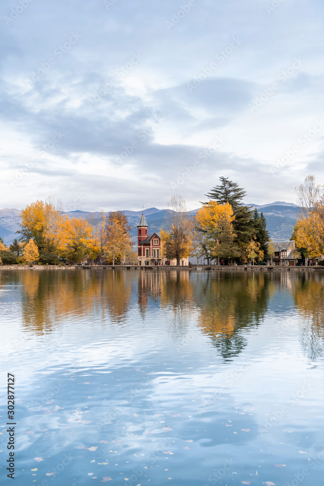 lake of Puigcerda AND SCHIERBECK PARK, town in Girona, Catalonia, in the midst of gardens rich in willows, conifers and other essences, the shores of this man-made lake are lined in pretty villas