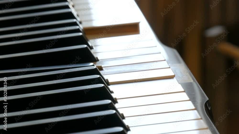 Mystical selfplaying piano without a pianist. The keys of the piano