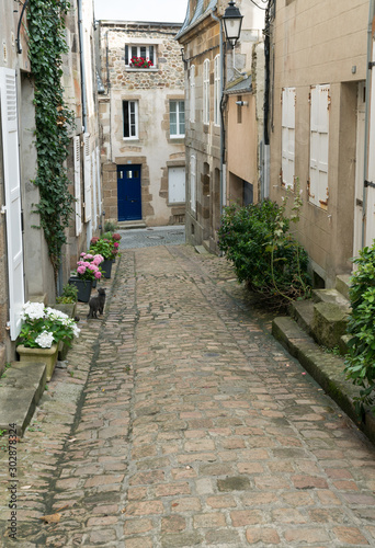 empty street with classic architecture of Normandy hosues in the old city of Granville