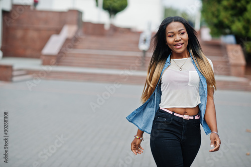 Young black female posed in the city. African women single portrait. © AS Photo Family