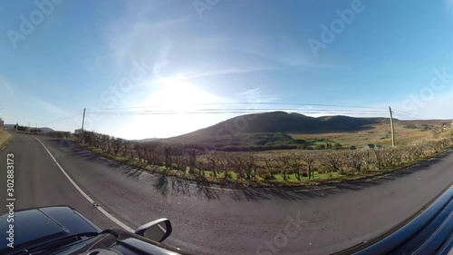 Driving from Glenkolumbkille towards Carrick - Donegal, Ireland photo