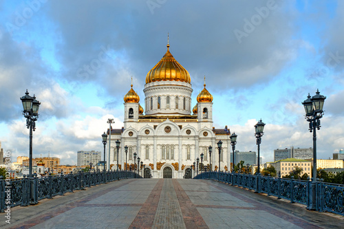 Morning cityscape with a view of the Cathedral of Christ the Savior, against the blue sky.