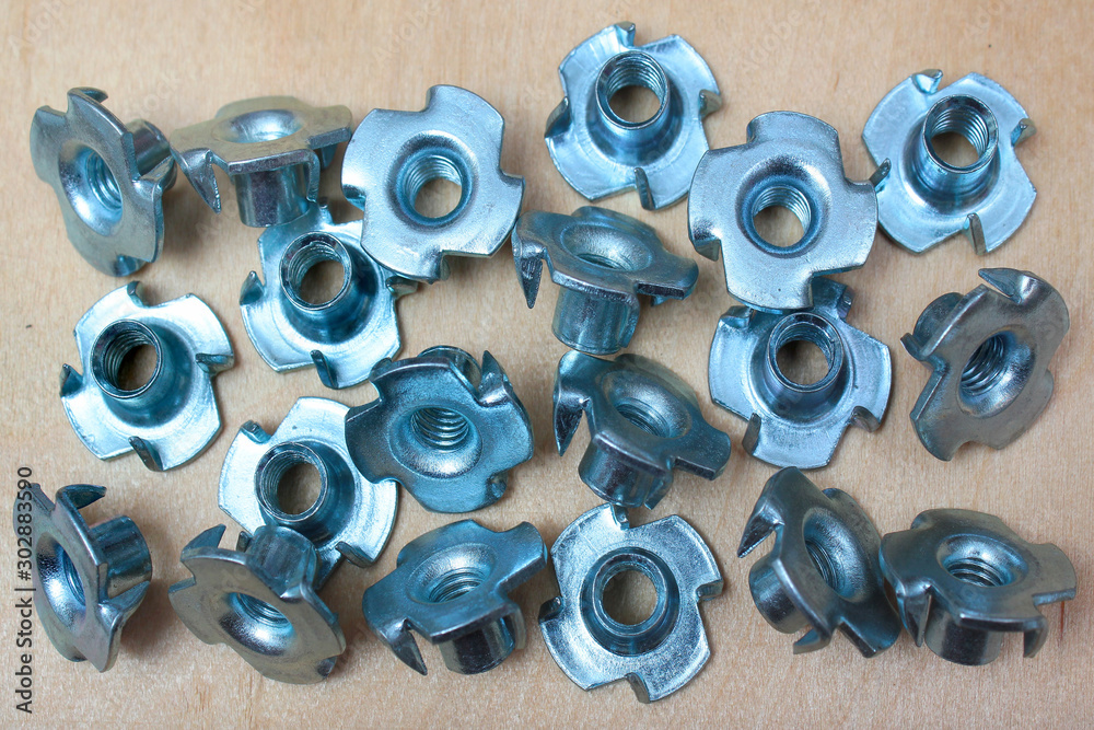 Pronged tee nuts for wood. Steel threaded rivet nuts. Pronged tee nuts for wood. Steel threaded rivet nuts.