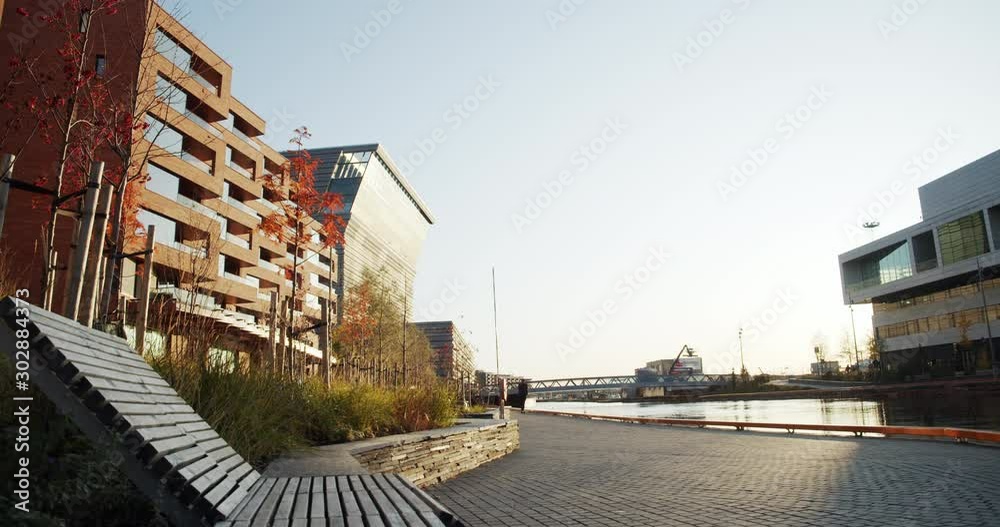 4K static low angle wide shot of Lambda, the new Edvard Munch museum, with famous paintings like The Anxiety, in an autumn sunset in the Bjørvika quarter in Oslo, Norway. 4K static low angle wide shot of Lambda, the new Edvard Munch museum, with famous paintings like The Anxiety, in an autumn sunset in the Bjørvika quarter in Oslo, Norway.