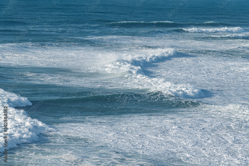 Foamy Atlantic ocean wave at Portugal coast. Foamy Atlantic ocean wave at Portugal coast.