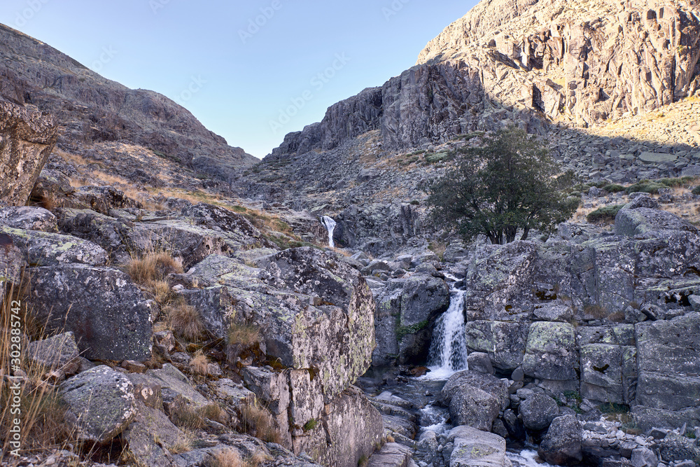 small waterfall of a mountain river