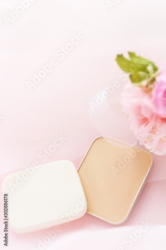Cosmetic Foundation on pink with copy space