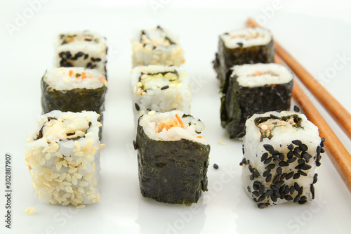 several makis on a white background 