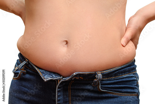 Close up of woman with excessive belly fat isolated on white background