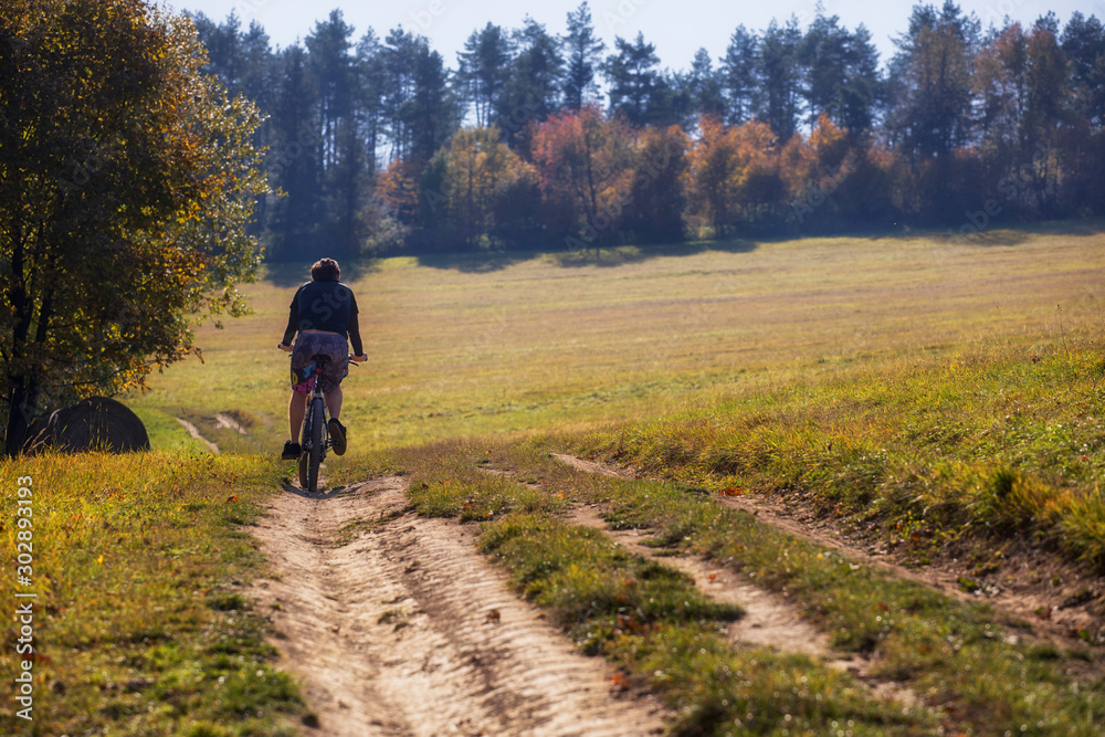 Cyclist ride on the bike path, Autumn bike ride