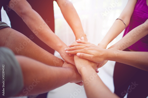 Teamwork hands Unite with power Is a good team of successful people Team work concept