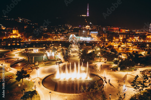 13.07.2018 Tbilisi, Georgia: view of the cultural Georgian night city of Tbilisi with its central square, tourists and night lights photo