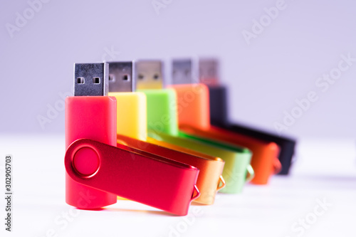 Vászonkép set of colourful usb flash drives isolated on white background
