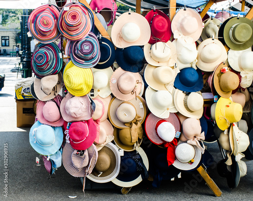Street hat shop in Ljubljana, Slovenia. Summer hats for tourists. 