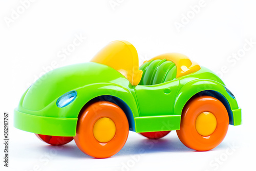 Plastic toy car on white background