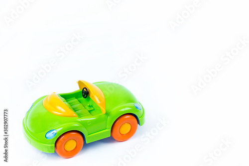 Plastic toy car on white background