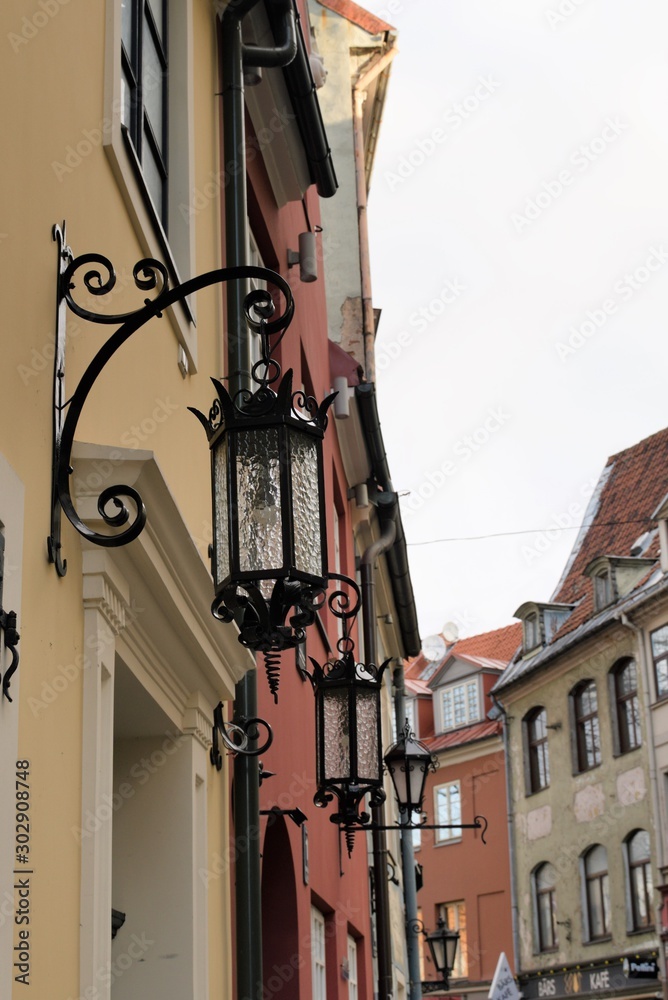 Riga, Latvia, November 2019. Beautiful vintage lanterns on a historic street in the city center.
