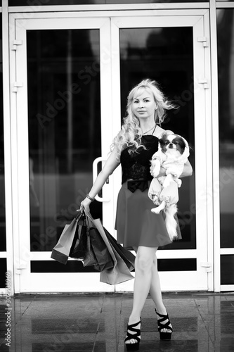 Beautiful blonde with little dog © alexkich