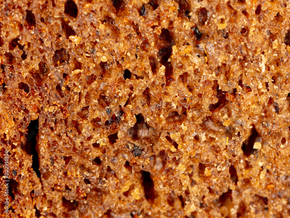 Black rye bread as an abstract background Black rye bread as an abstract background
