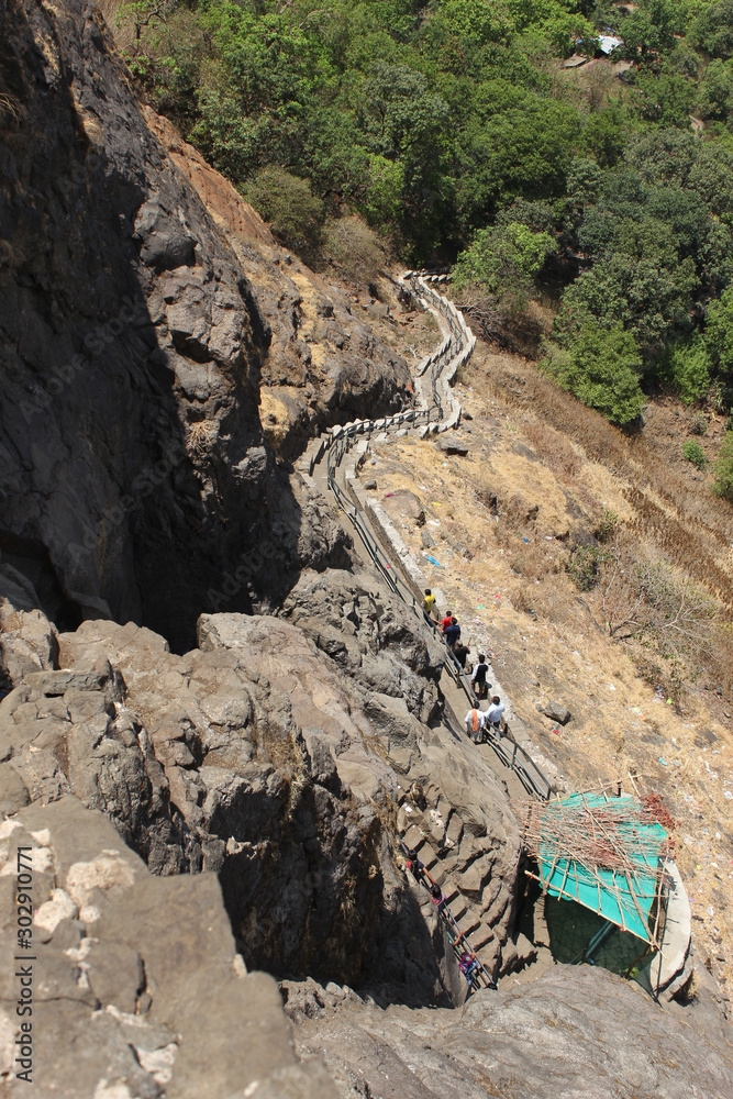 NASHIK, MAHARASHTRA, INDIA, April 2019, People walking on the steps of Brahmagiri hill at Trimbakeshwar NASHIK, MAHARASHTRA, INDIA, April 2019, People walking on the steps of Brahmagiri hill at Trimbakeshwar
