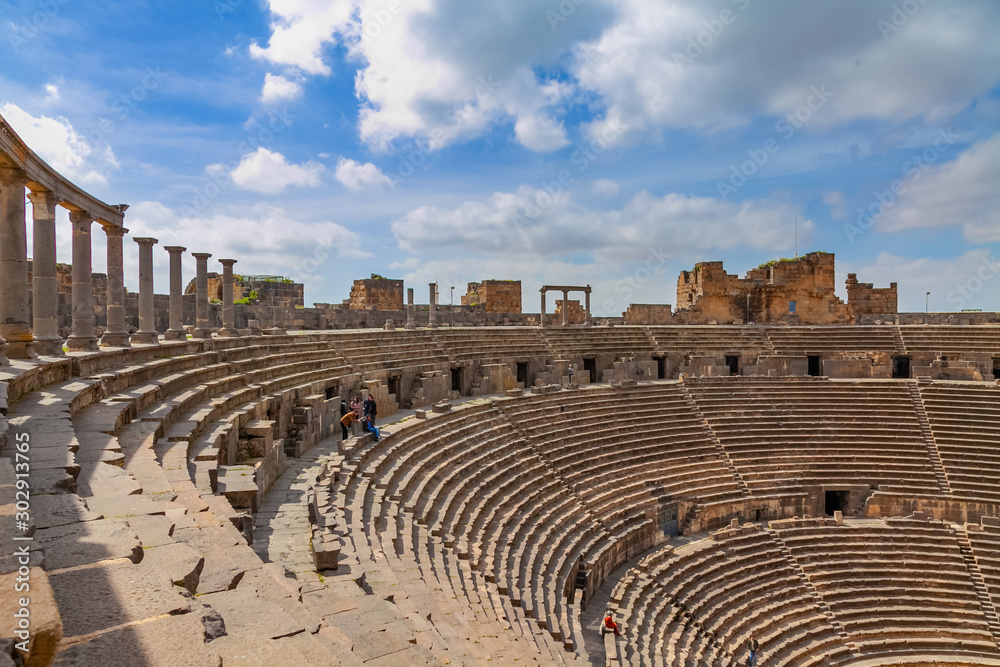 Theater at the Ancient City of Bosra, UNESCO World Heritage. and ruins of roman city Bosra in Syria