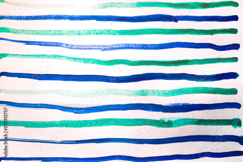 Multi-colored splashes of watercolor paints on white paper. Abstract spring background