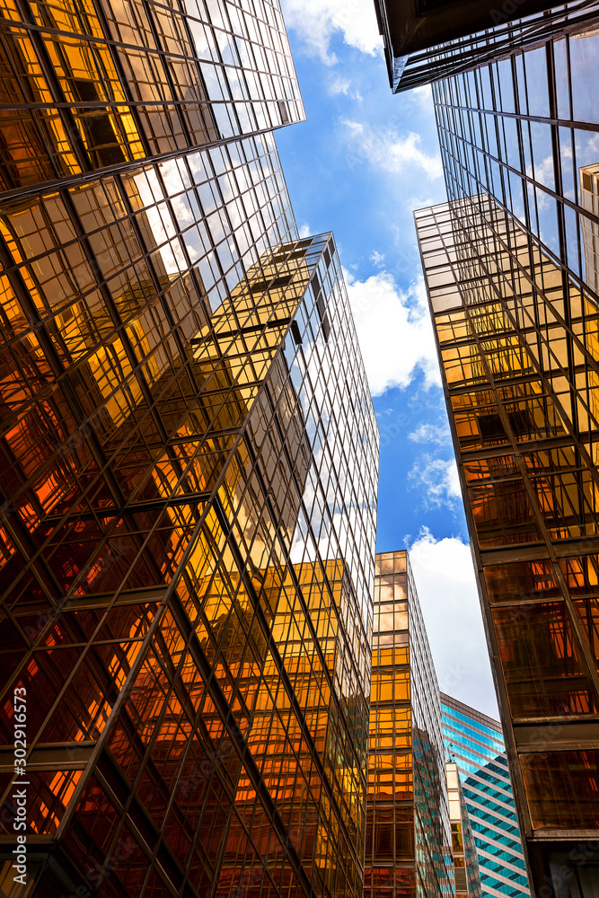 Fototapeta premium Symmetrical mirrored office buildings in Hong Kong