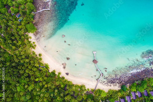 Tropical rainforest sea beach with mountain of palm tree