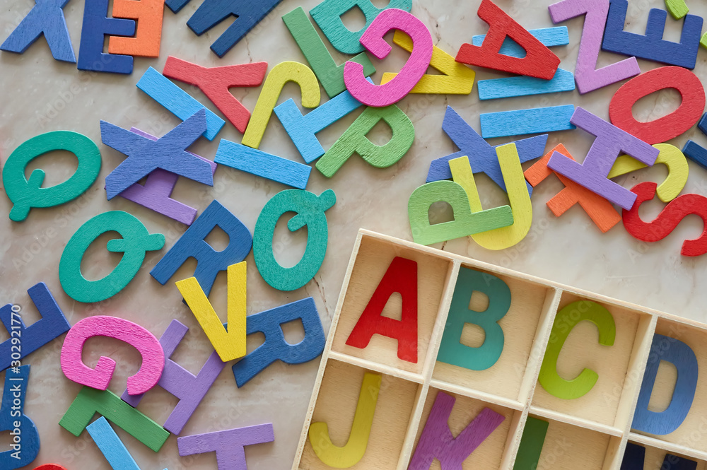 The colorful wooden alphabet toy The colorful wooden alphabet toy