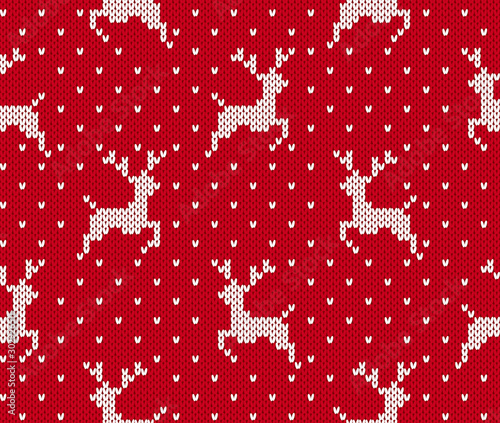 Knitted christmas pattern. Red seamless print. Vector illustration.